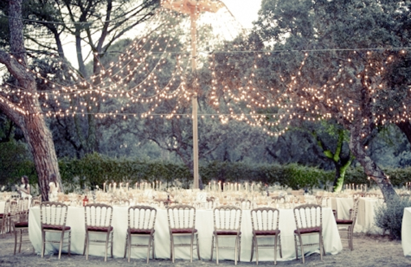 I am a big fairylight fan This canopy is gorgeous via Once Wed 